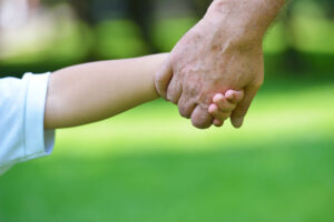 happy grandfather and child in park SBI 300813392